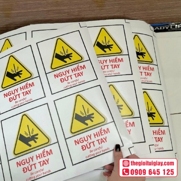 Mẫu tem cảnh báo kẹp tay bền đẹp giá tốt