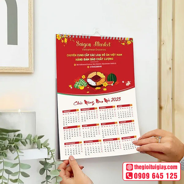 Mẫu lịch treo tường chúc mừng năm mới Saigon Market