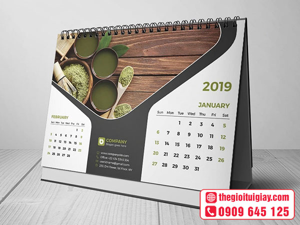 Mẫu lịch để bàn bằng chất liệu giấy couche, đế bìa cứng bồi